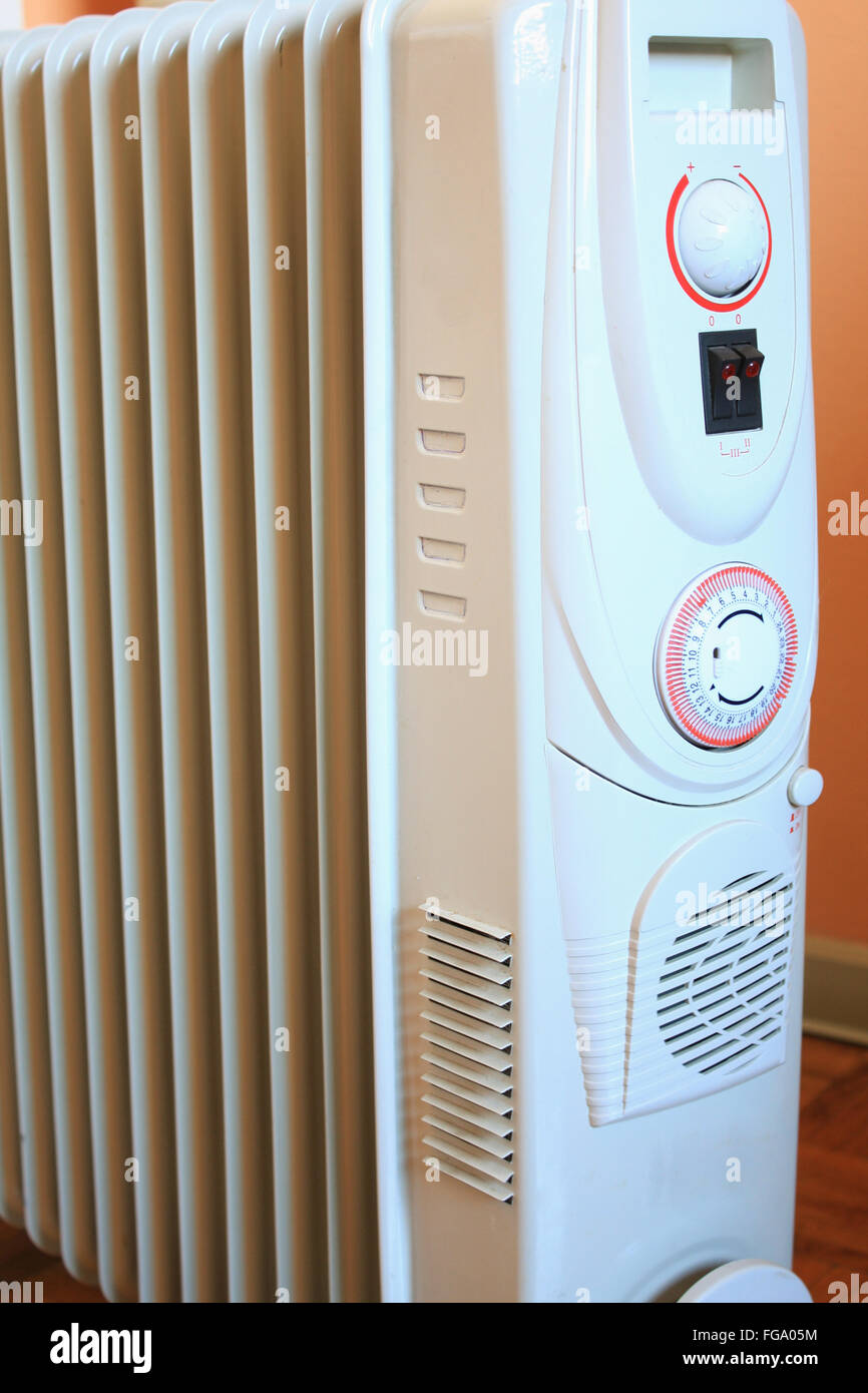 eletric radiator heater with thermostat Stock Photo