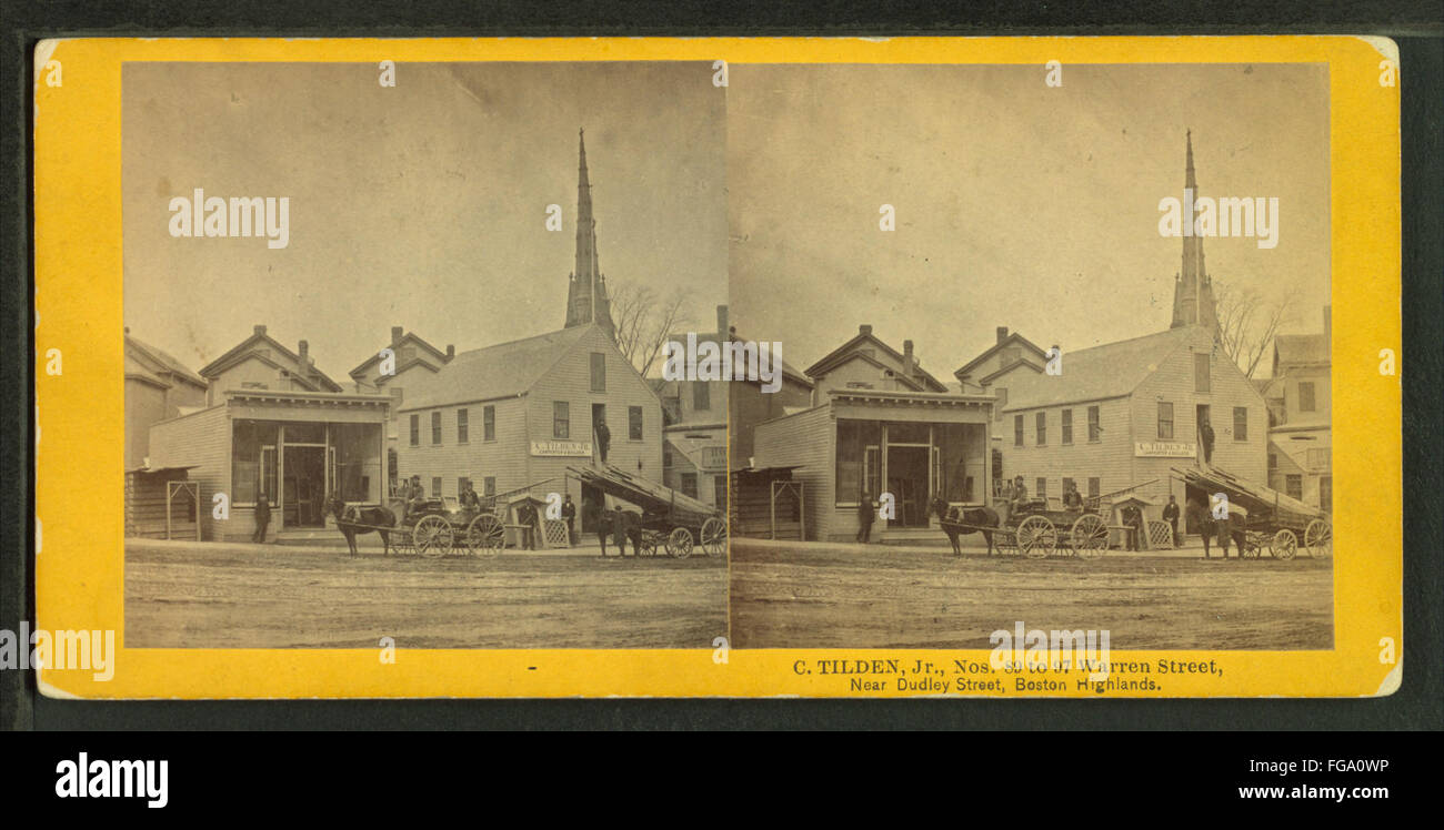 A historical photograph from the Robert N. Dennis collection showcasing Warren Street near Dudley Street in the Boston Highlands. The image offers a vintage view of the area, capturing the street layout and architecture from the past. Stock Photo