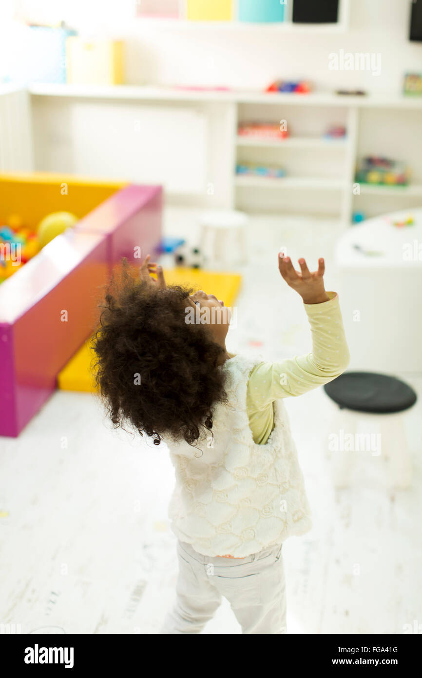 Little african girl at playroom Stock Photo