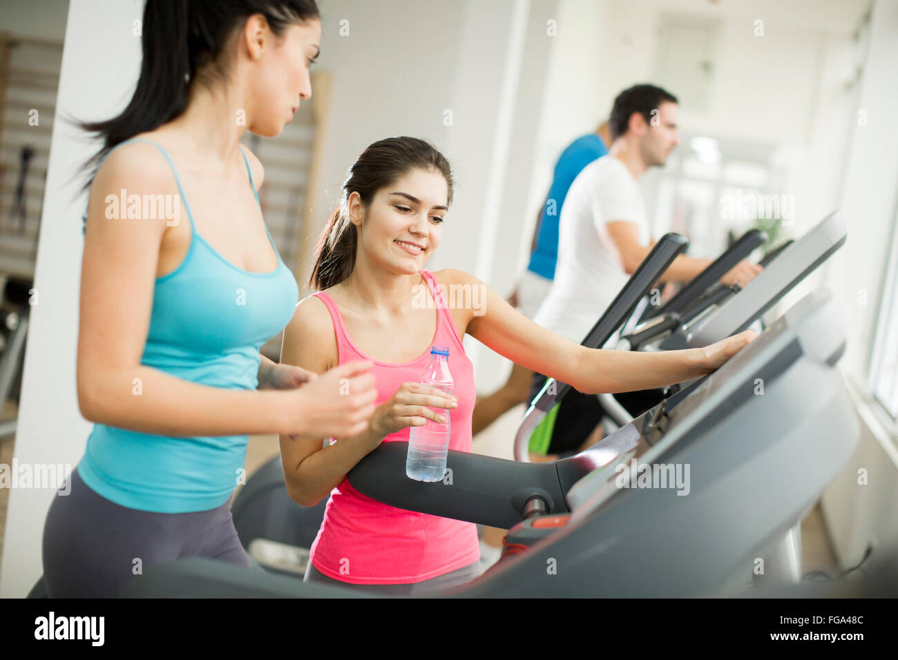 Young people training in the gym Stock Photo