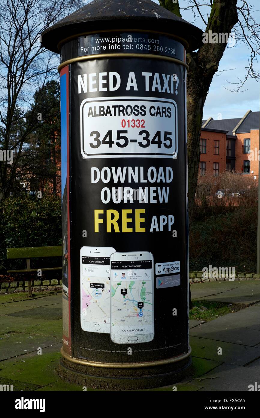Advertisement to download a free app for a local taxi service in Derby UK Stock Photo