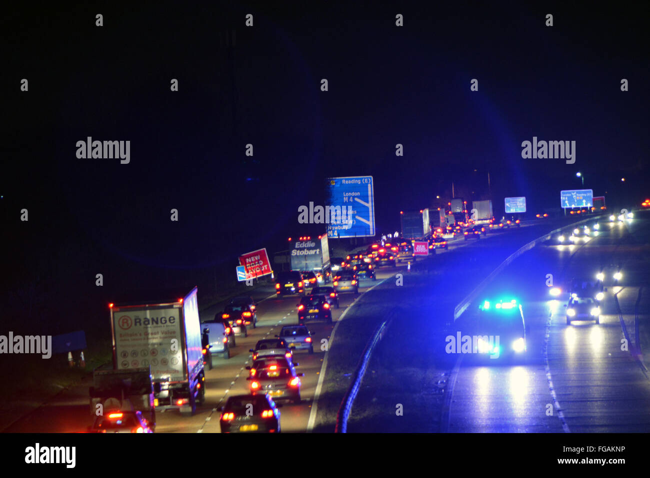 A329M traffic and emergency services at night Stock Photo