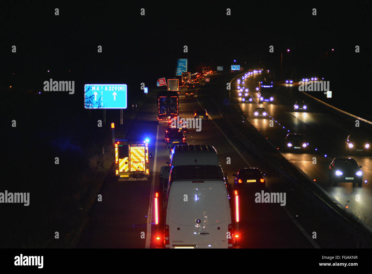 A329M traffic and emergency services at night Stock Photo