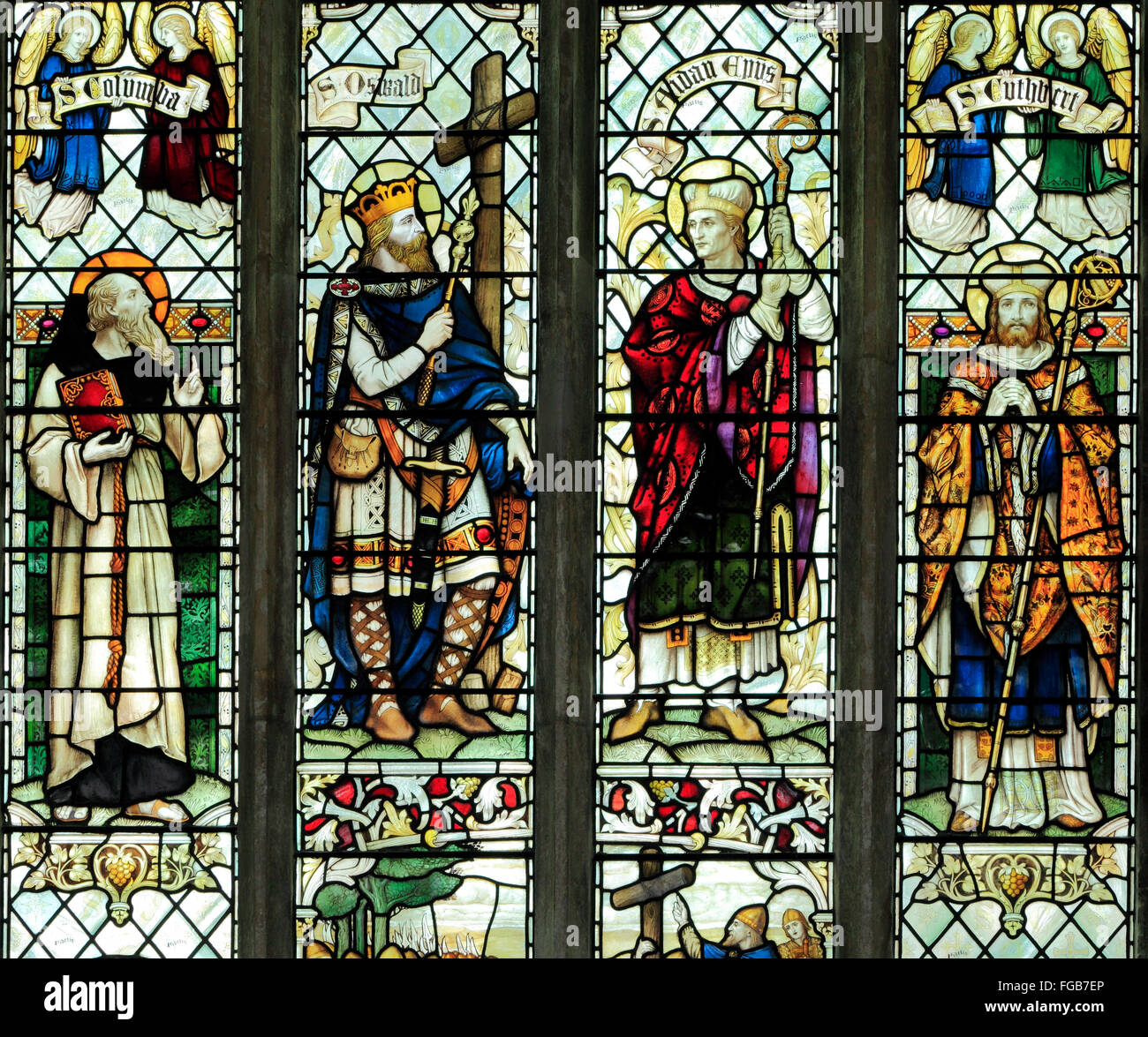 St. Columba, St. Oswald, St. Aidan, St. Cuthbert,  stained glass window by J. Powell & son, 1900, Blakeney, Norfolk England UK Stock Photo