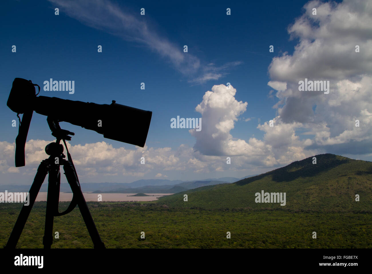 A telephoto lens silhouetted against the sky, Ethiopia Stock Photo