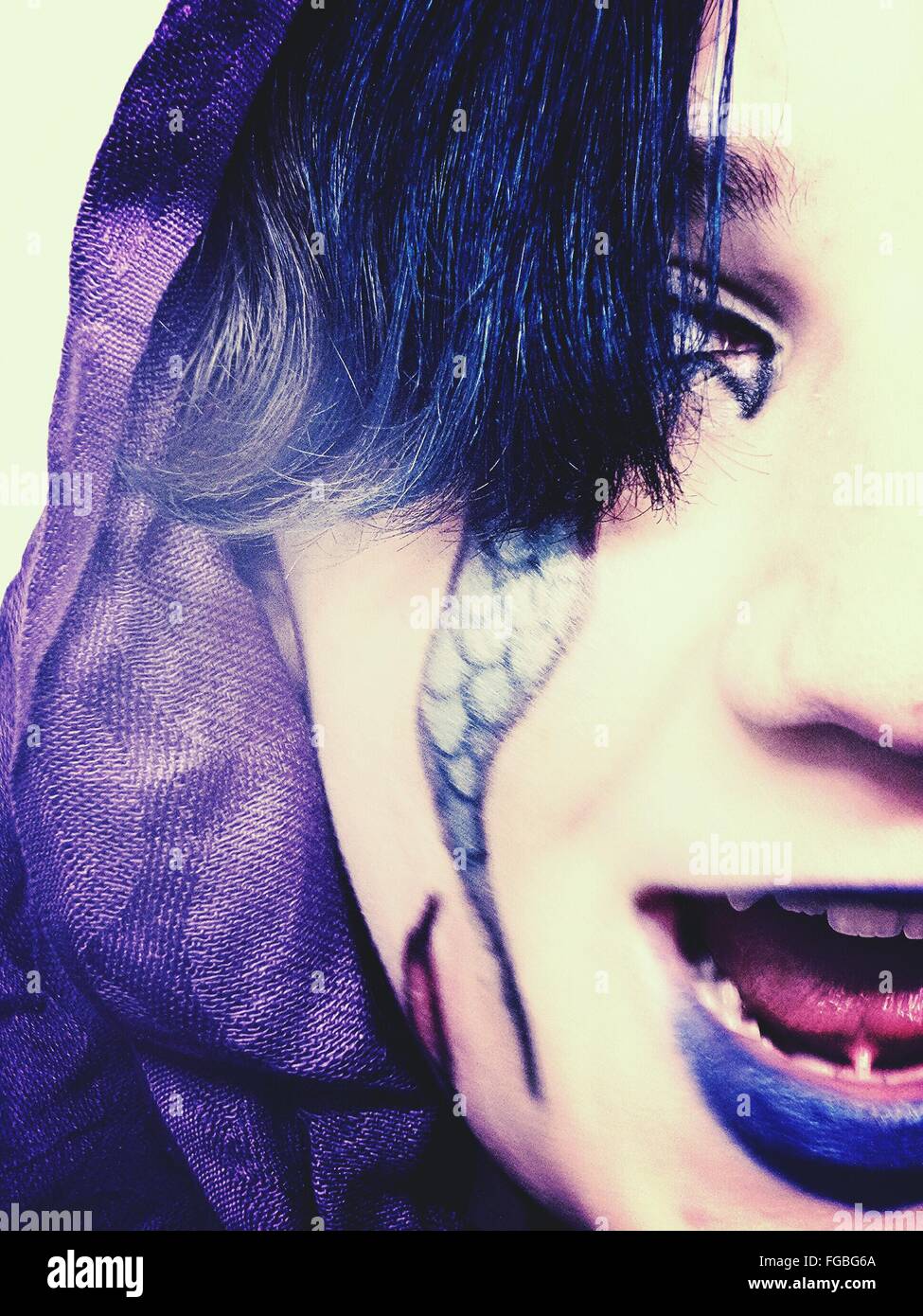 Close-Up Of Young Woman Wearing Face Paint Stock Photo