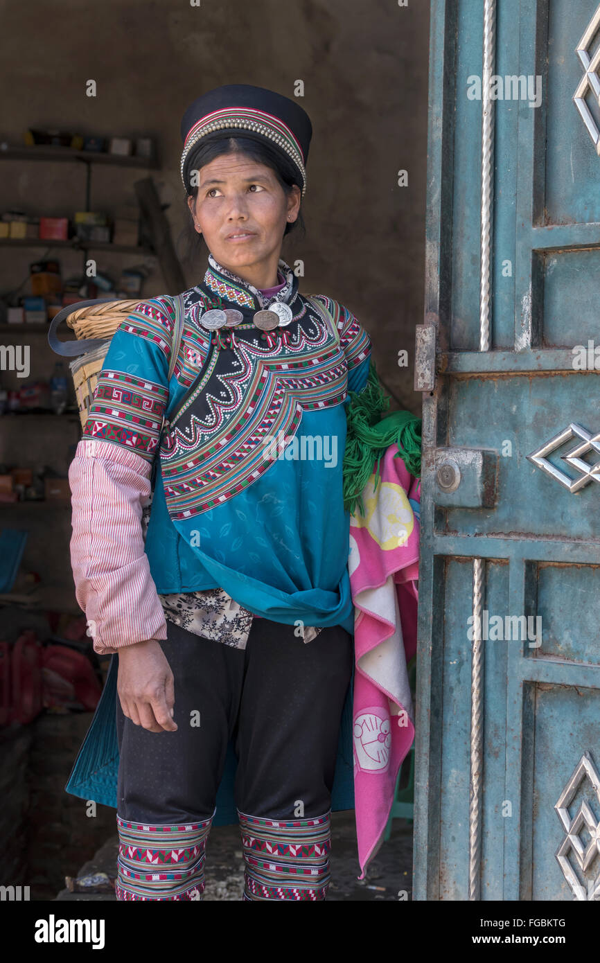 Hani woman at the Niujiaozhai Market, Yunnan Province, China Stock Photo