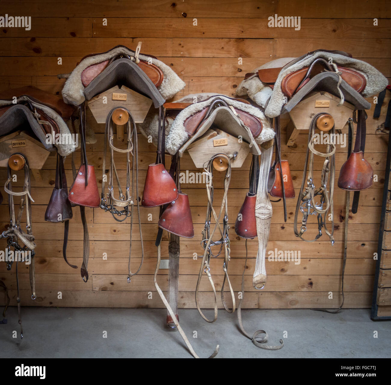 Traditional saddles room in Torres del Paine National Park with named ...