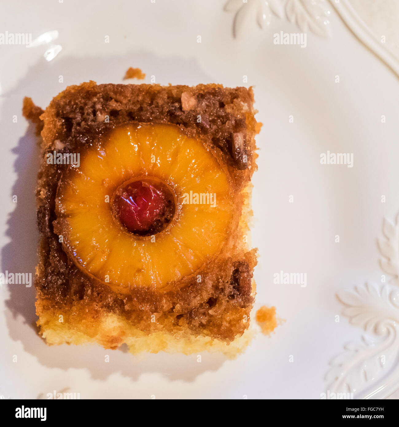 A serving of Pineapple upside down cake, with brown sugar, pineapple