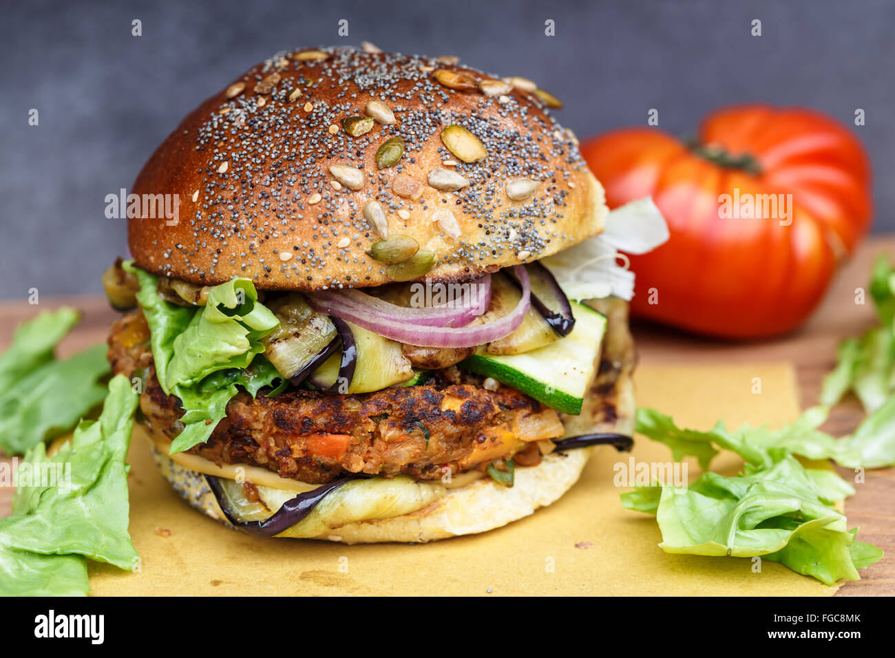 Veggie burger with onion, courgette, aubergine Stock Photo Alamy