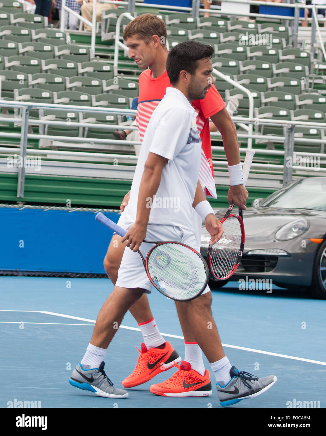 Delray Beach, Florida, US. 18th Feb, 2016. The Filipino-Belarusian third seed duo TREAT HUEY (foreground) and MAX MIRNYI (in rear) are through to the ATP World Tour Delray Beach Open semi-finals after a 6-3, 6-4 triumph over Australians Chris Guccione and Bernard Tomic. Credit:  Arnold Drapkin/ZUMA Wire/Alamy Live News Stock Photo