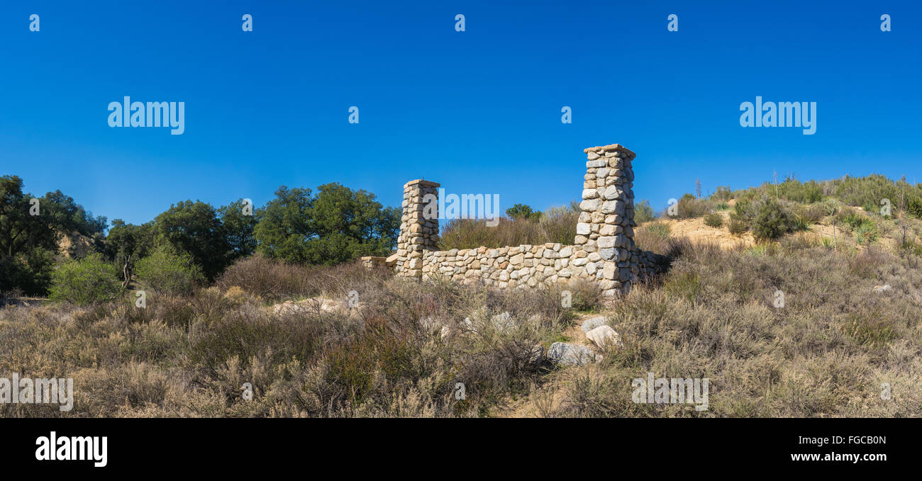 Destroyed Ranch Wide view of ranch house destroyed by fire with only porch columns ...