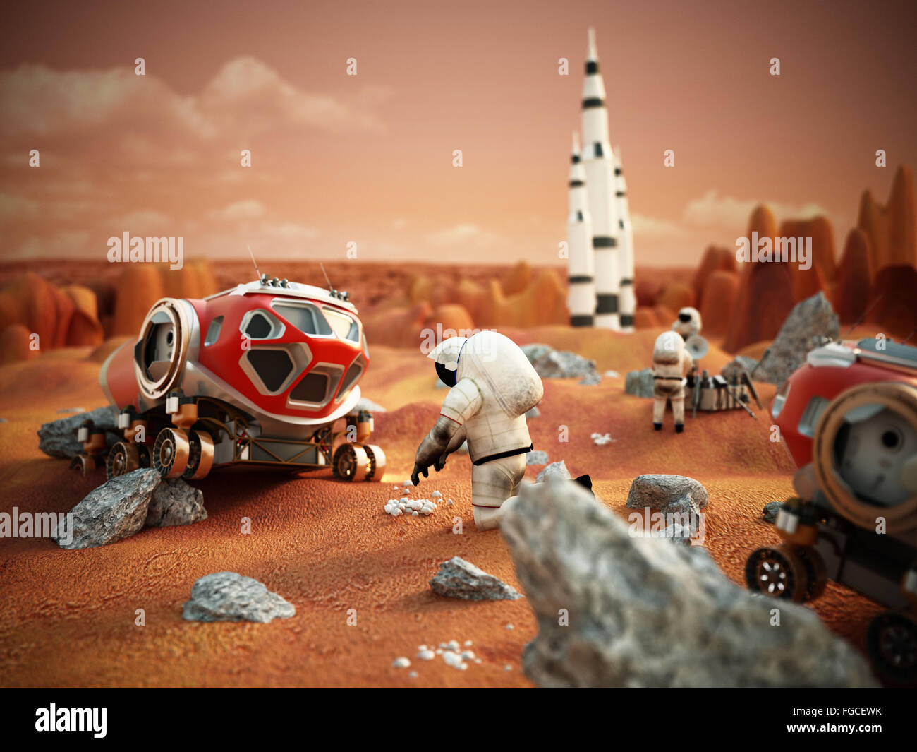Fictitious scene including vehicles and astronauts depicts manned Mars mission Stock Photo