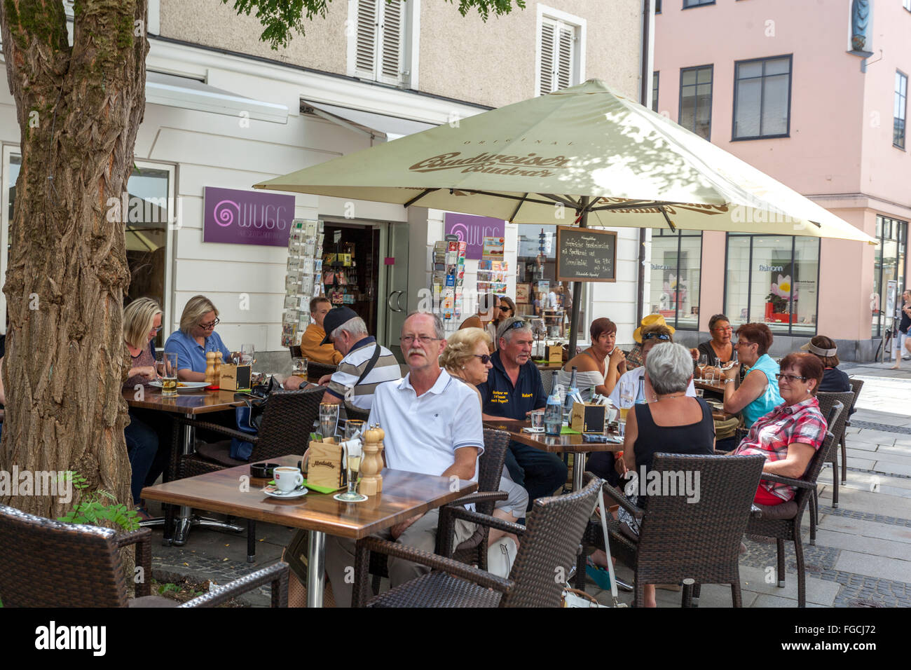 People, Tourists Passau cafe on Rindermarkt Square, Passau Old Town Lower Bavaria, Passau Germany Stock Photo