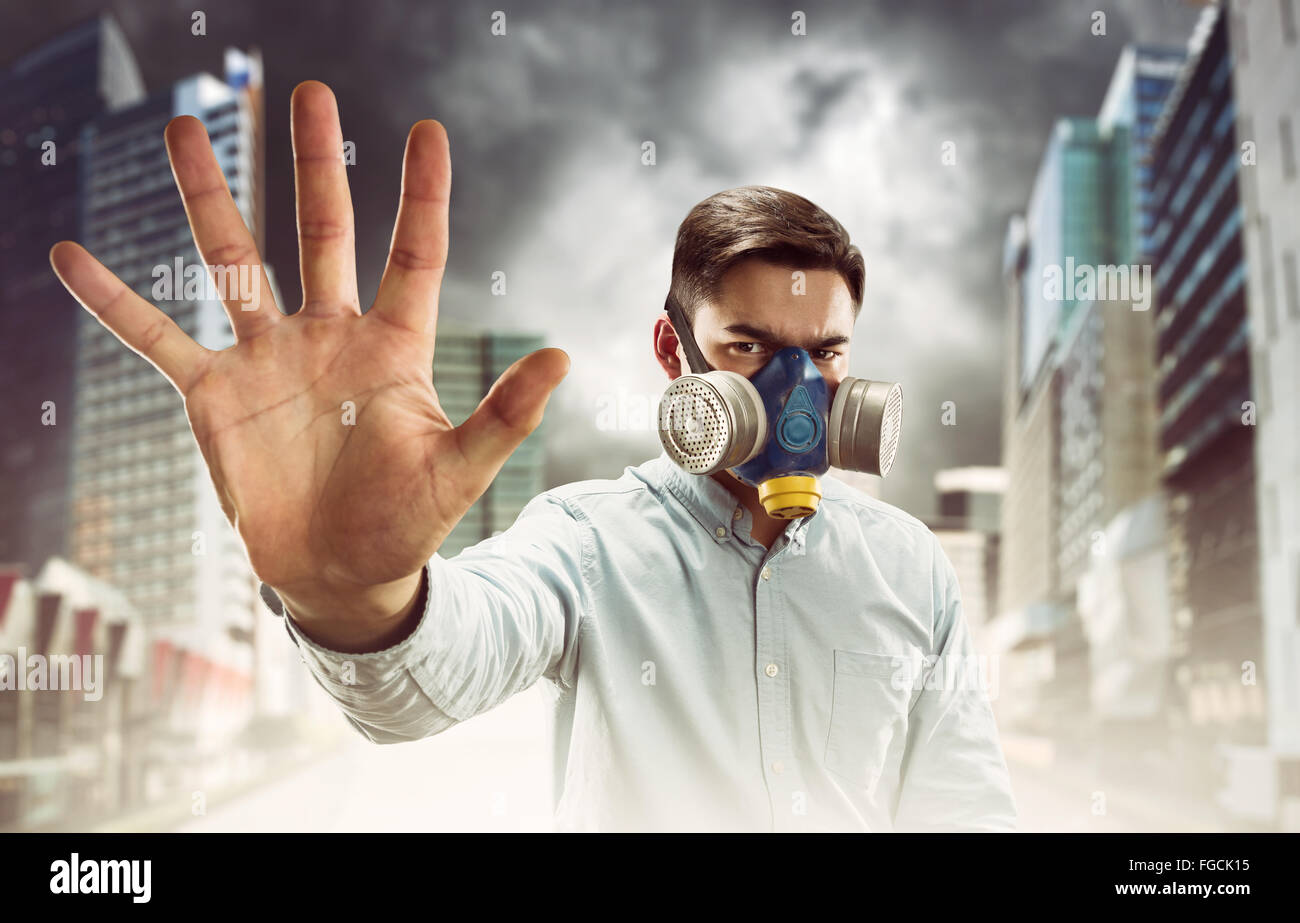 Young man in gasmask Stock Photo Alamy