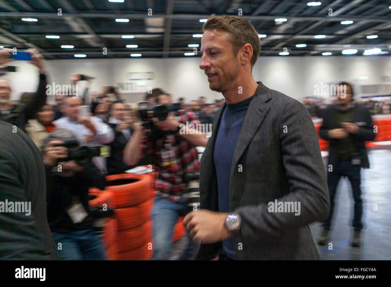 London, UK. 18th February, 2016. Jenson Button is breaking off from his busy preparations for the forthcoming grand prix season to attend the opening night of the London Classic Car Show (18-21 February) at Excel in London’s Docklands. The 2009 Formula One World Champion joins host BBC F1 presenter Suzi Perry, plus top guests from the motor sport and classic car worlds.   The star-studded Preview Evening starts a four-day Great Debate to determine ‘which nation has produced the world’s best cars’. Credit:  Bluefly/Alamy Live News Stock Photo