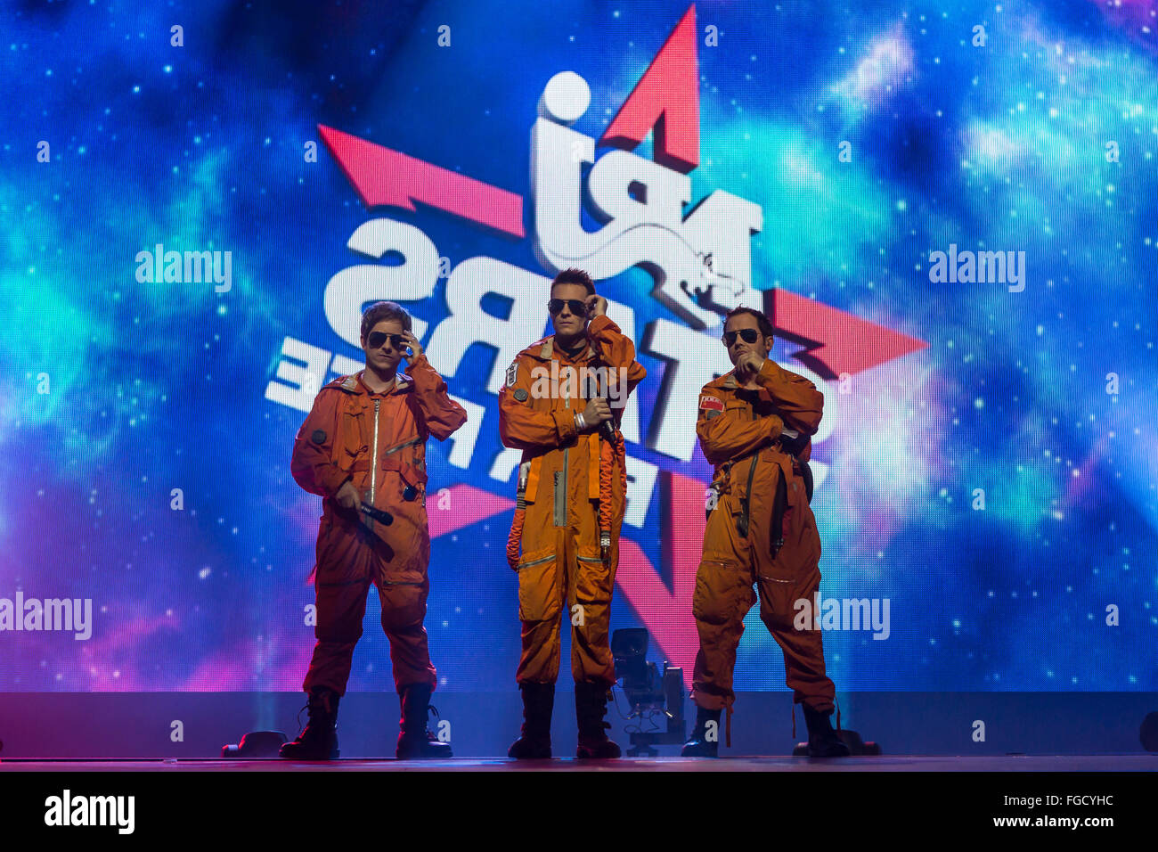 three men in suits spaceman Stock Photo