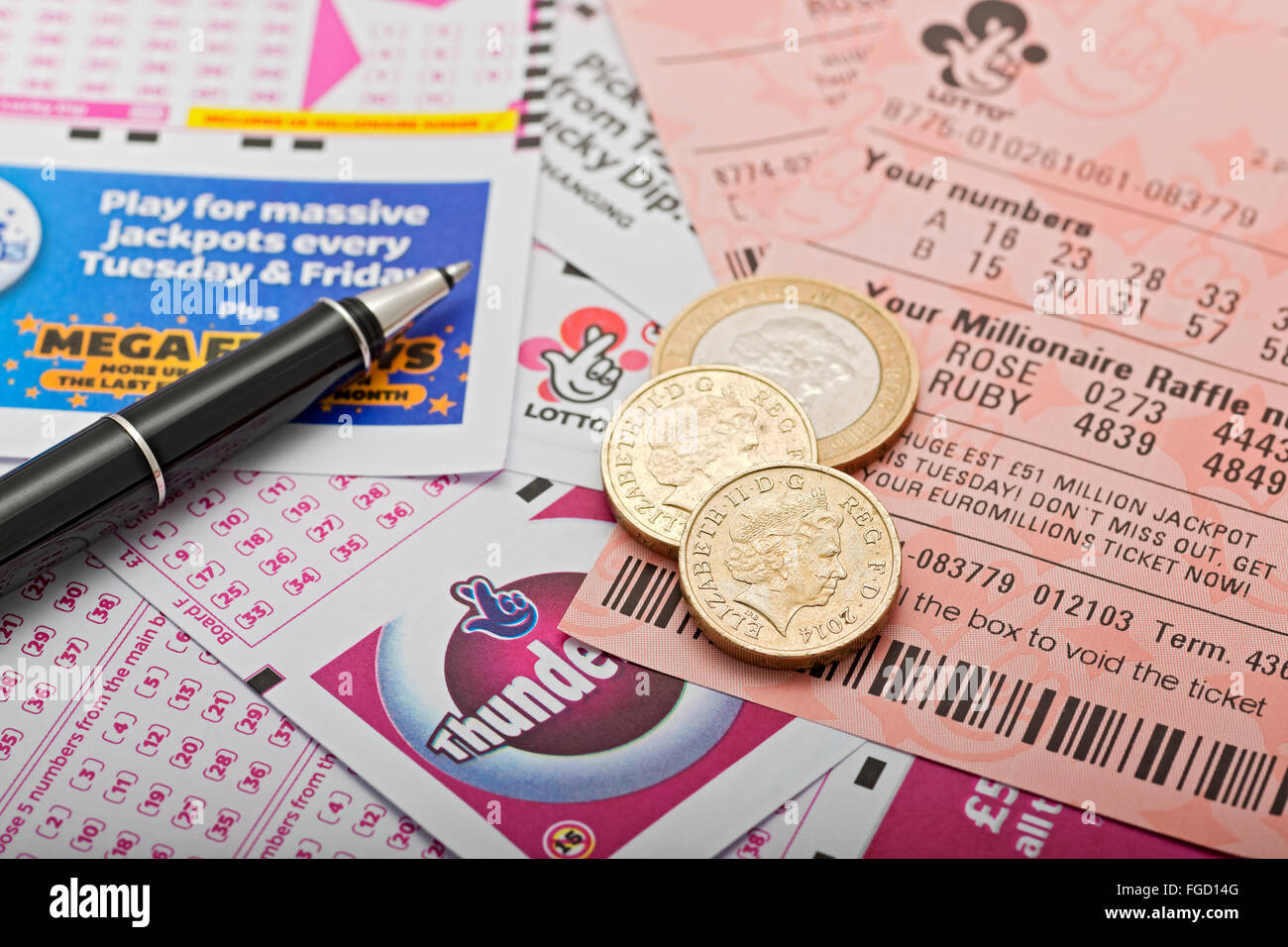 Close up of Lotto National Lottery ticket slip tickets money and slips England UK United Kingdom GB Great Britain Stock Photo