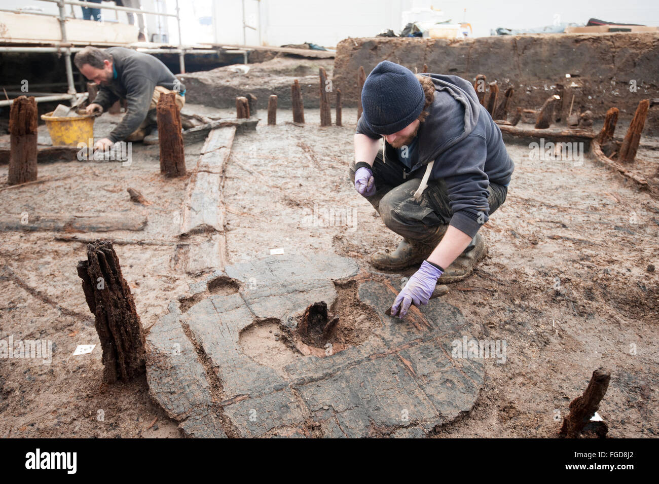 Archaeologists have uncovered a 3000 year old Bronze Age wheel at Must farm site in Cambridgeshire, U.K. Stock Photo