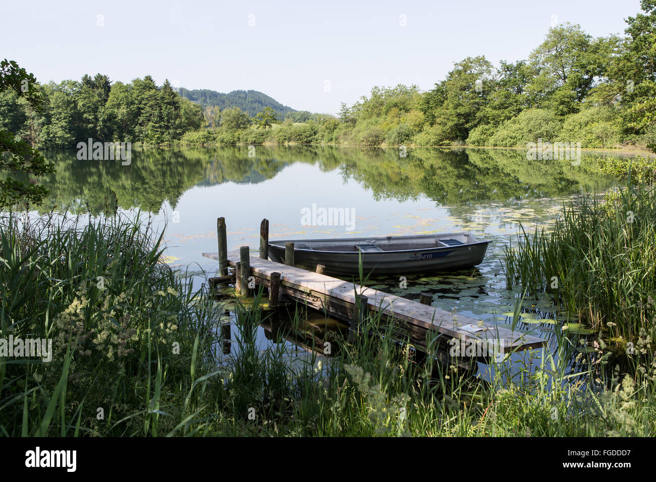 Pier with boat Stock Photo