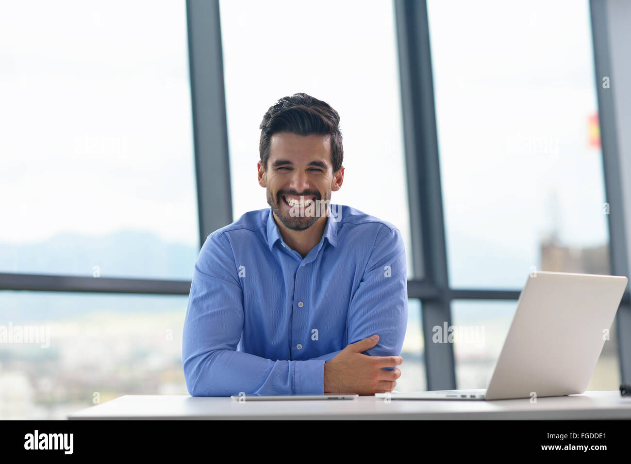 happy young business man at office Stock Photo