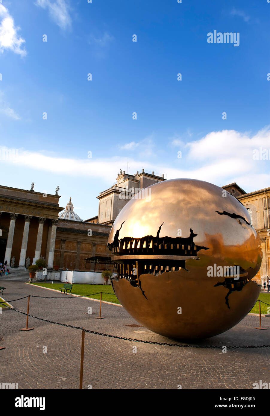 Court yard in Vatican. Sculpture the globe in court yard on September 20, 2010 in Vatican, Rome, Italy Stock Photo