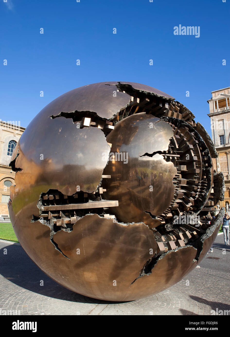 Court yard in Vatican. Sculpture the globe in court yard on September 20, 2010 in Vatican, Rome, Italy Stock Photo