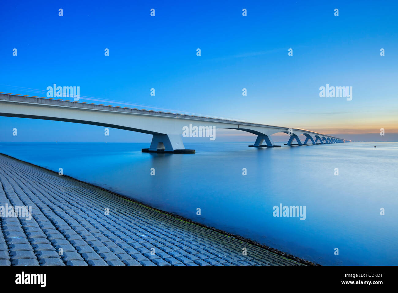 The Zeelandbrug (Zeeland Bridge) in the Dutch province of Zeeland, photographed at sunrise. At the time of construction in the 6 Stock Photo