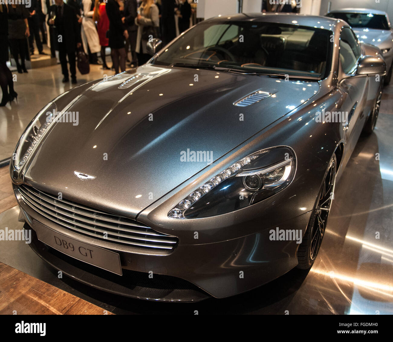 Three Aston Martin sports cars including the DB5 from Goldfinger and the DB10 from Spectre on display in Harrods.  Featuring: Aston Martin DB9 GT Where: London, United Kingdom When: 13 Jan 2016 Stock Photo