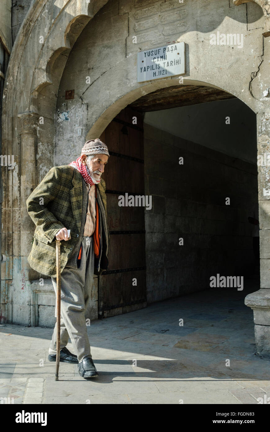 Old man with walking stick hi-res stock photography and images - Alamy