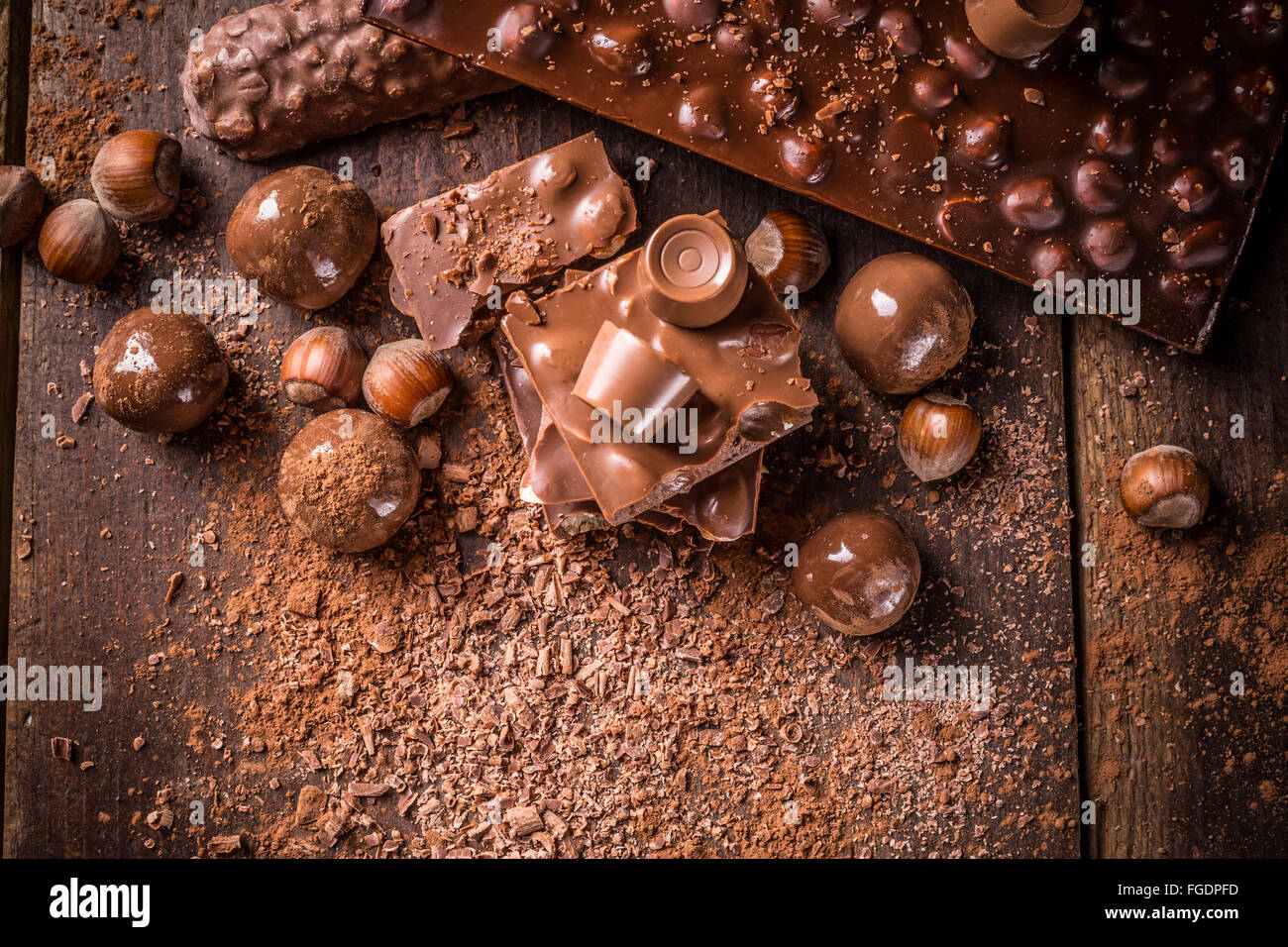 Assorted chocolate pralines and bars with filbert Stock Photo