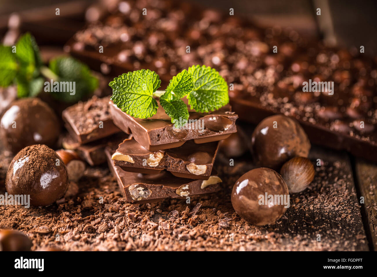 Assortment of fine chocolates: dark, and milk chocolate with hazelnut Stock Photo