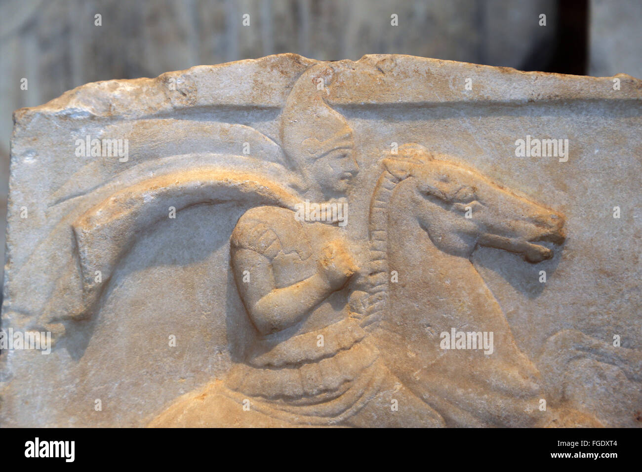 Greek art. Stela. Gentleman. 350-340 century BC. Greece. Marble. Gentleman wearing a Phrygian type helmet. Louvre Museum. Paris. Stock Photo