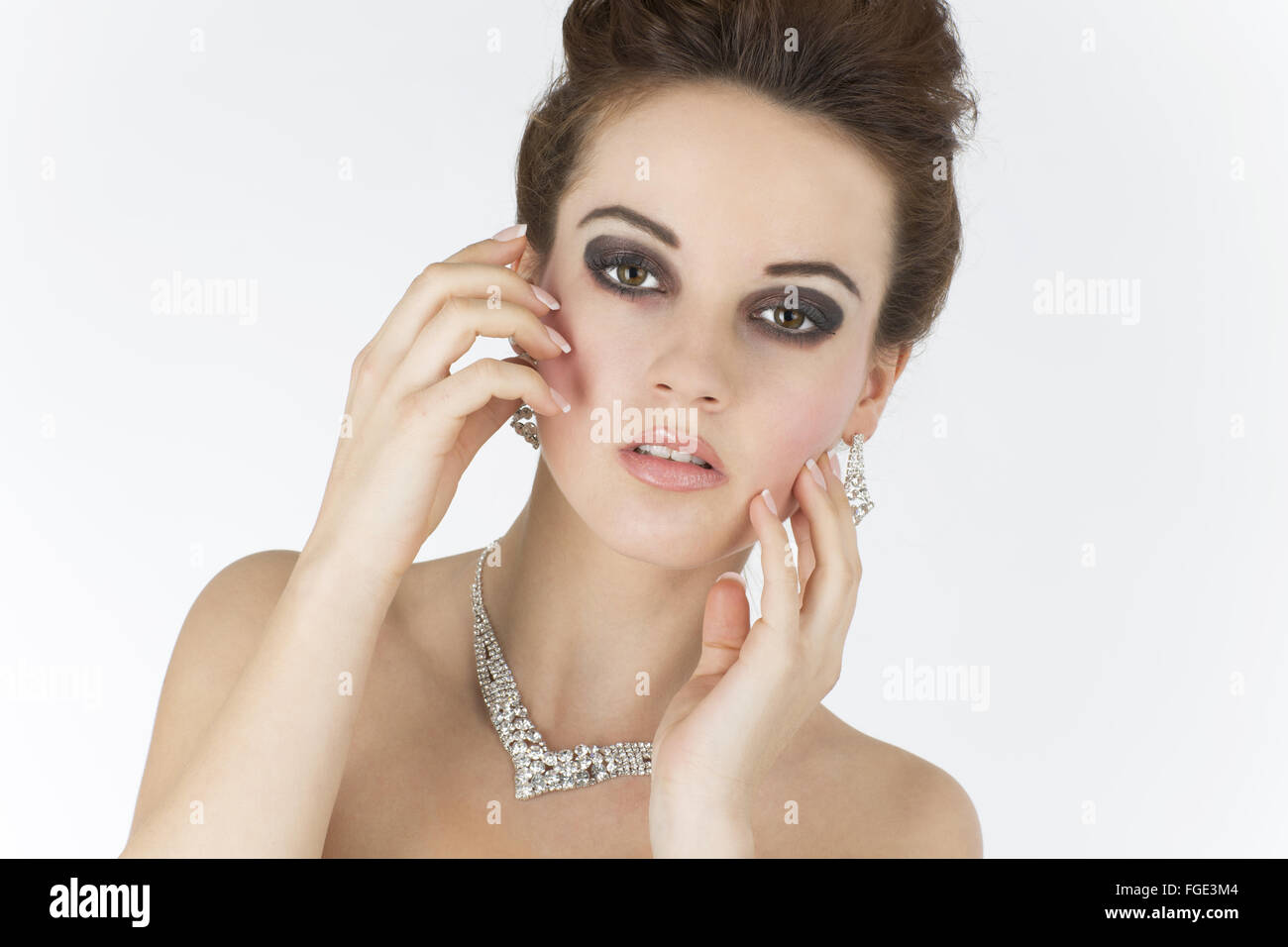 Young woman with jewelry, Portrait Stock Photo