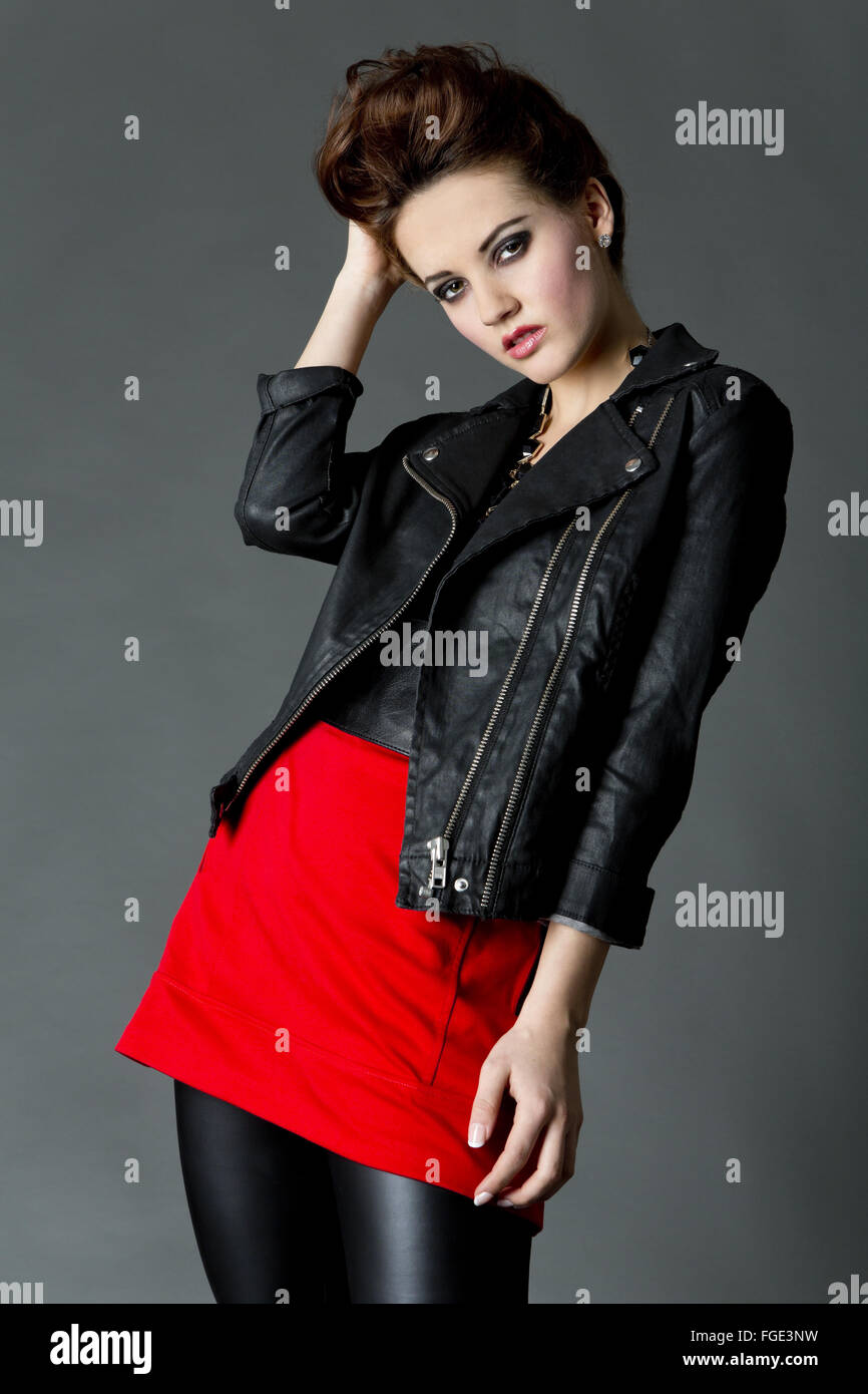 Young woman in leather outfit, Fashion Stock Photo