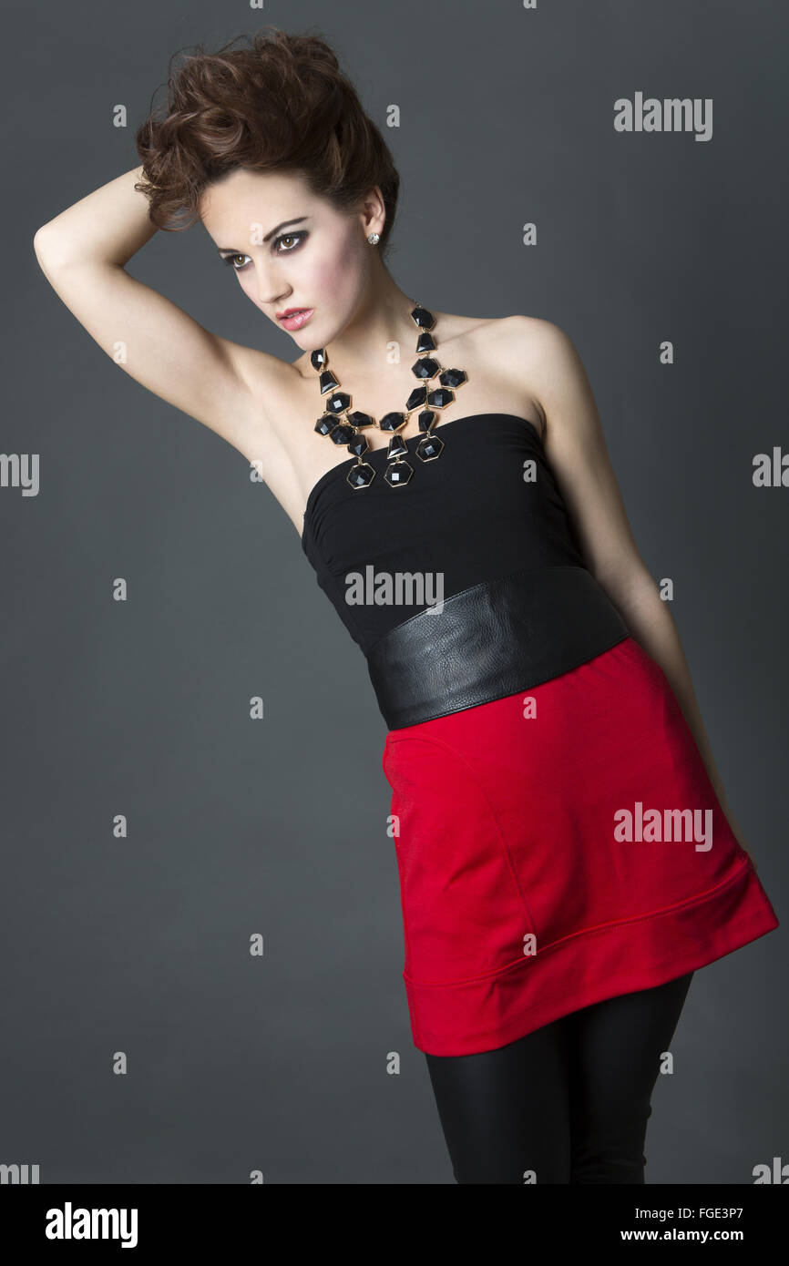 Young woman in leather outfit, Fashion Stock Photo