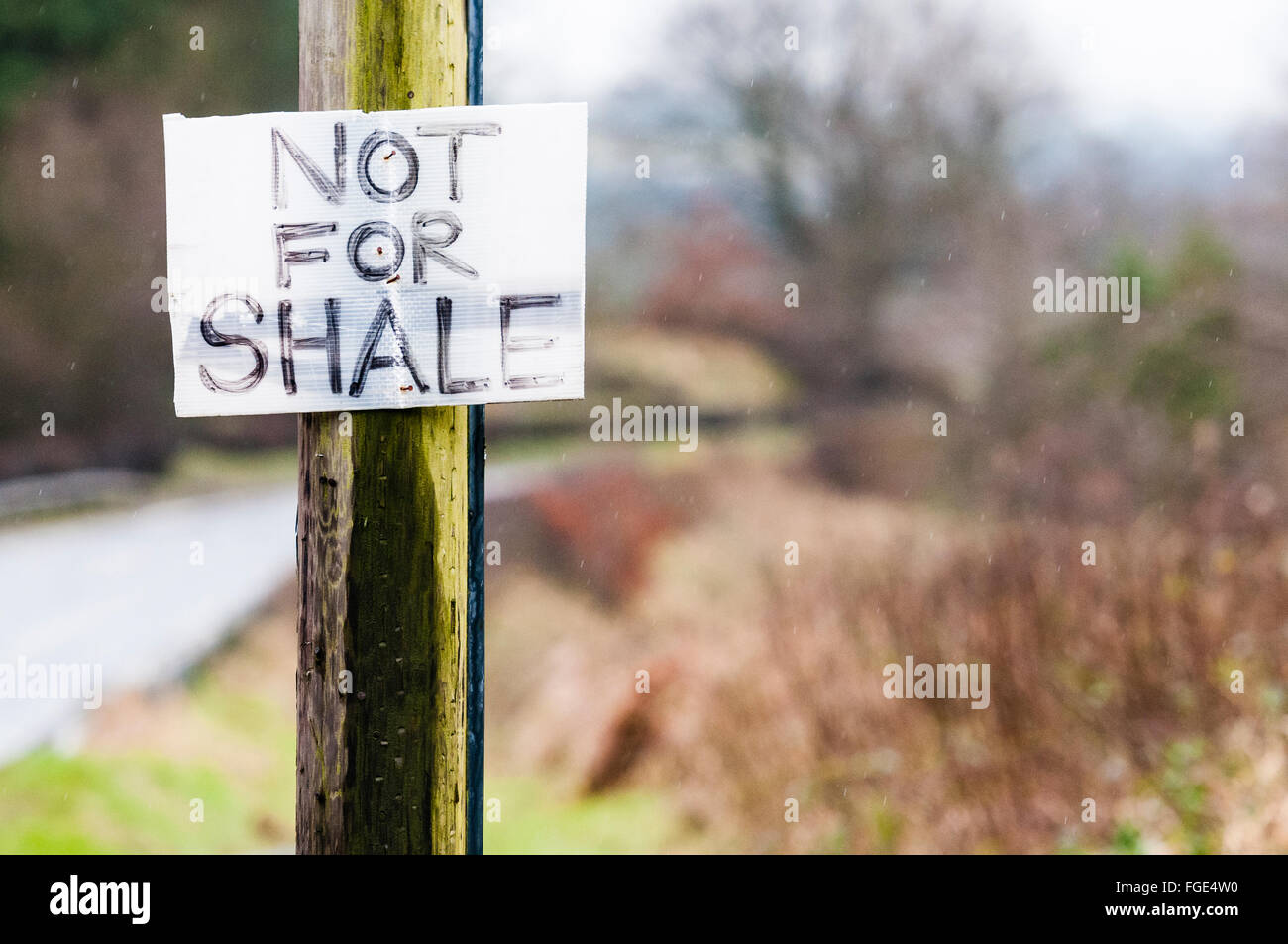 Sign nailed to a telegraph pole saying 'Not for Shale' in protest against plans to drill for oil. Stock Photo