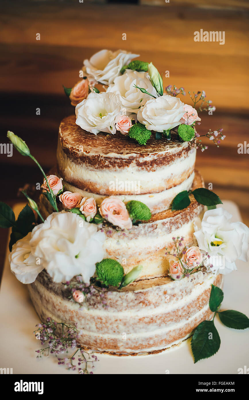 Wedding cake with roses whipped cream Stock Photo Alamy