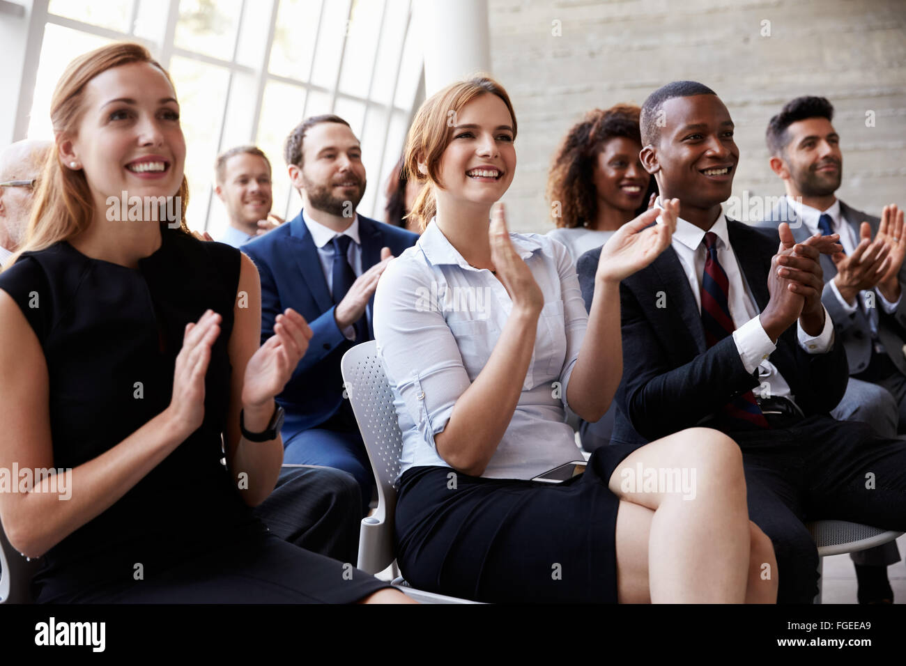 Audience Applauding Speaker At Business Conference Stock Photo