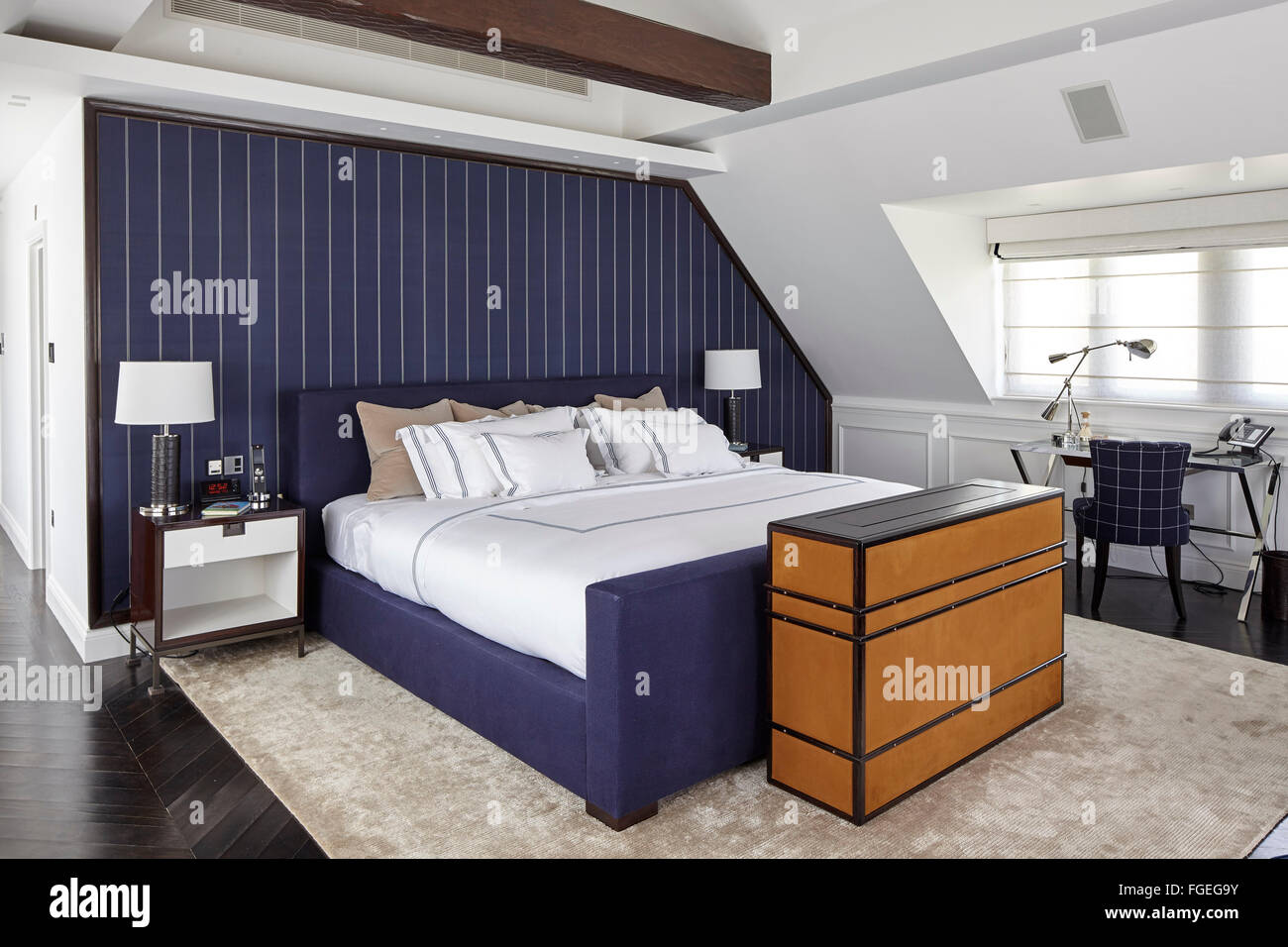 Master Bedroom With Dark Blue Pinstripe Fabric Wall Covering With