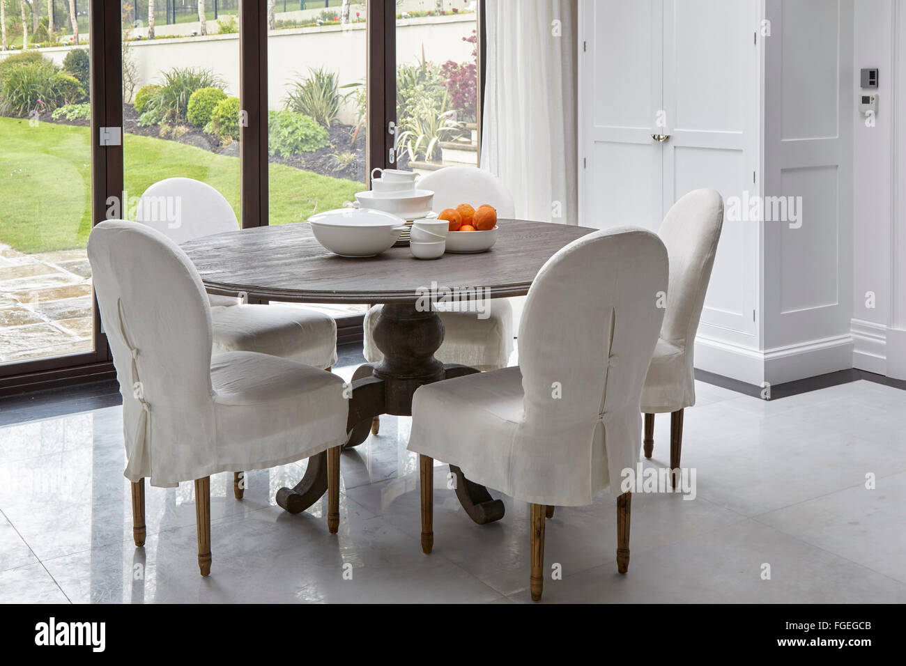 Kitchen dining table by window. Tudor Hall, Potters Bar, United Kingdom