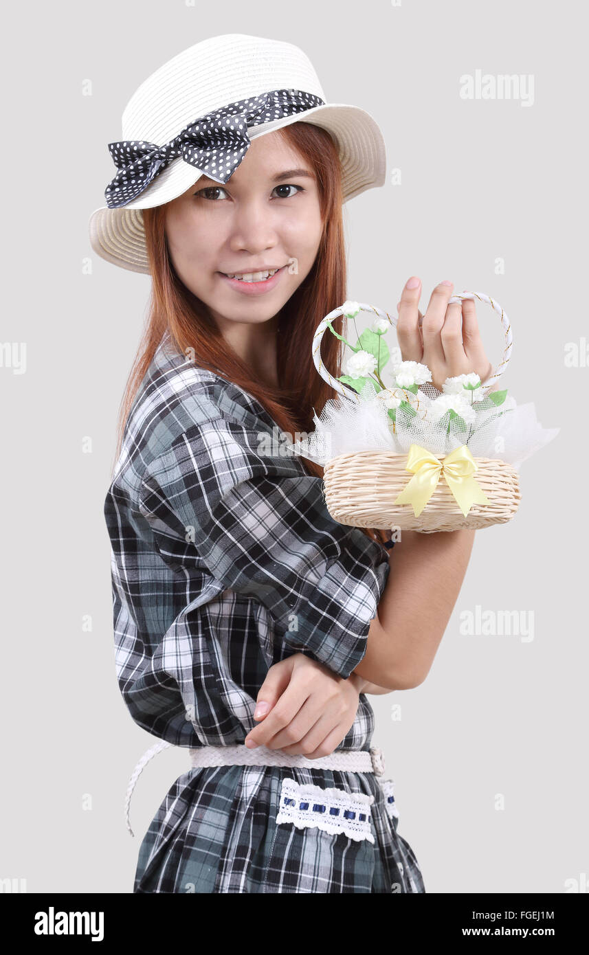 Image of woman hold flowers bag with blurred background Stock Photo