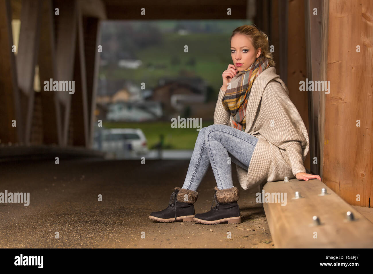 Young blond woman in winter clothes Stock Photo