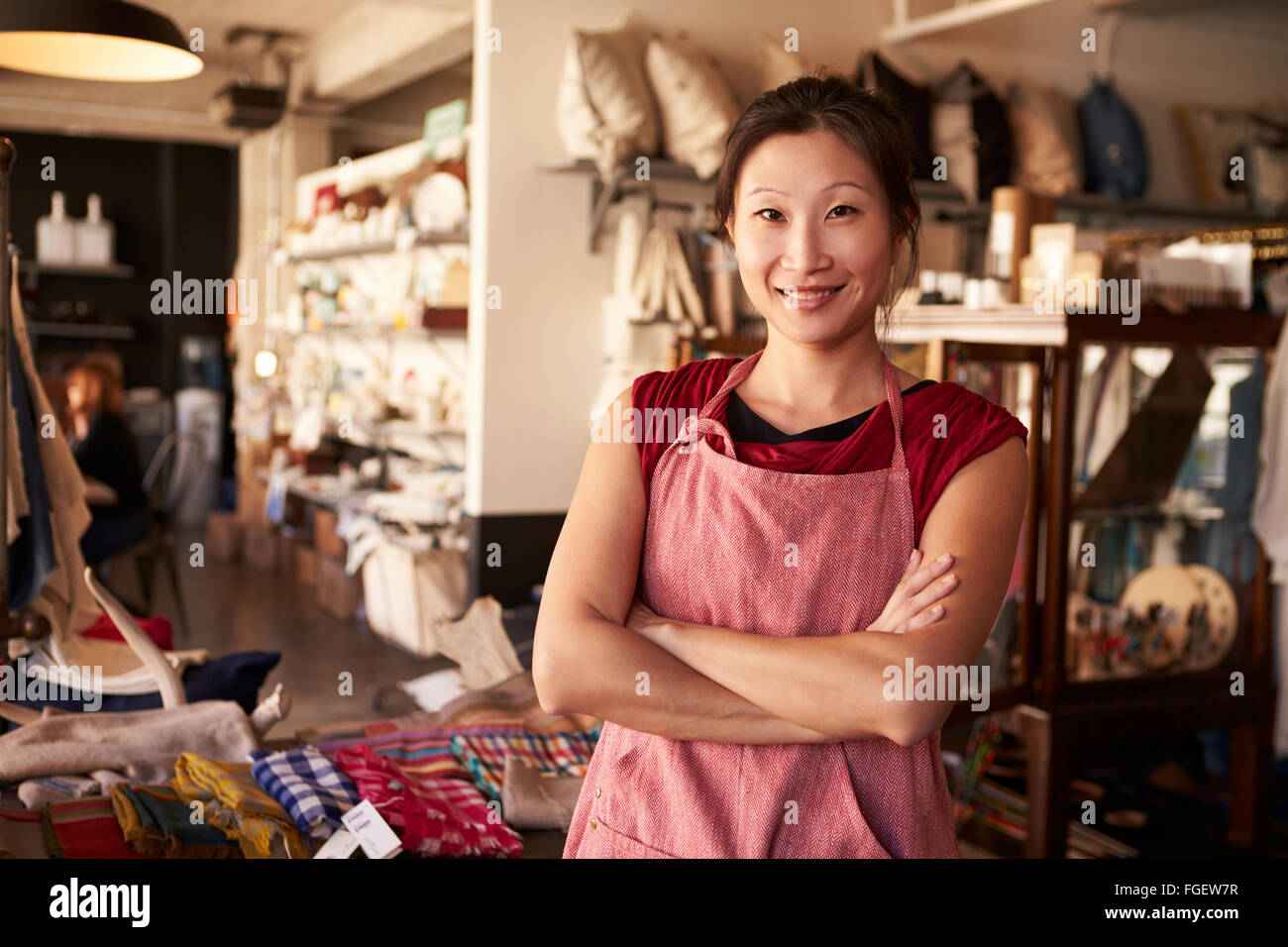 Portrait Of Female Owner Standing In Gift Store Stock Photo