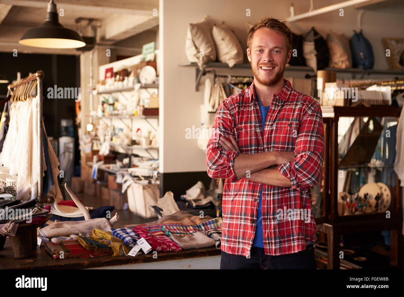 Portrait Of Male Owner Standing In Gift Store Stock Photo