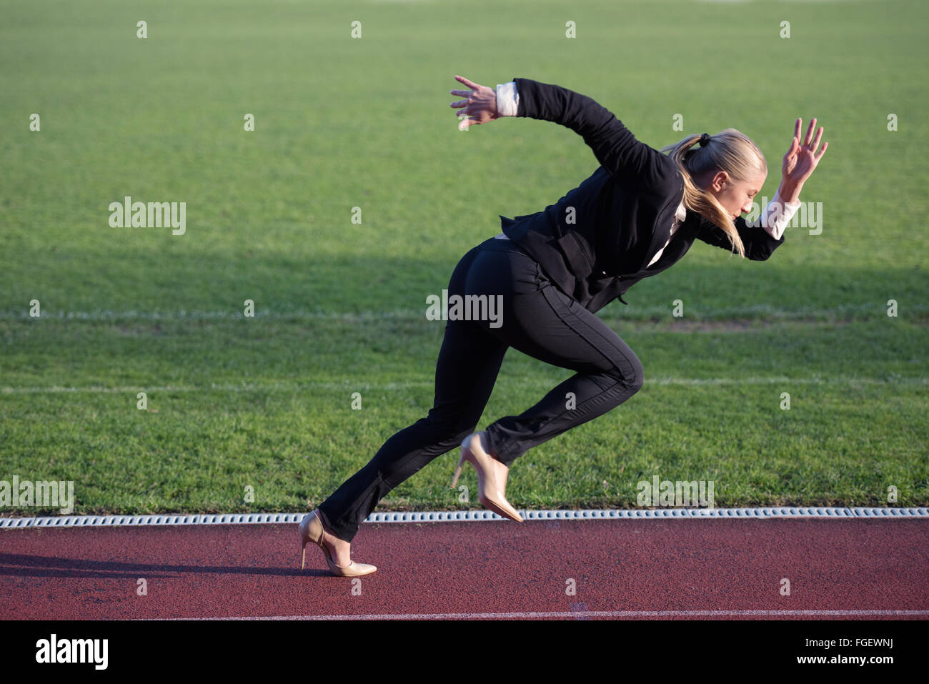 business woman ready to sprint Stock Photo