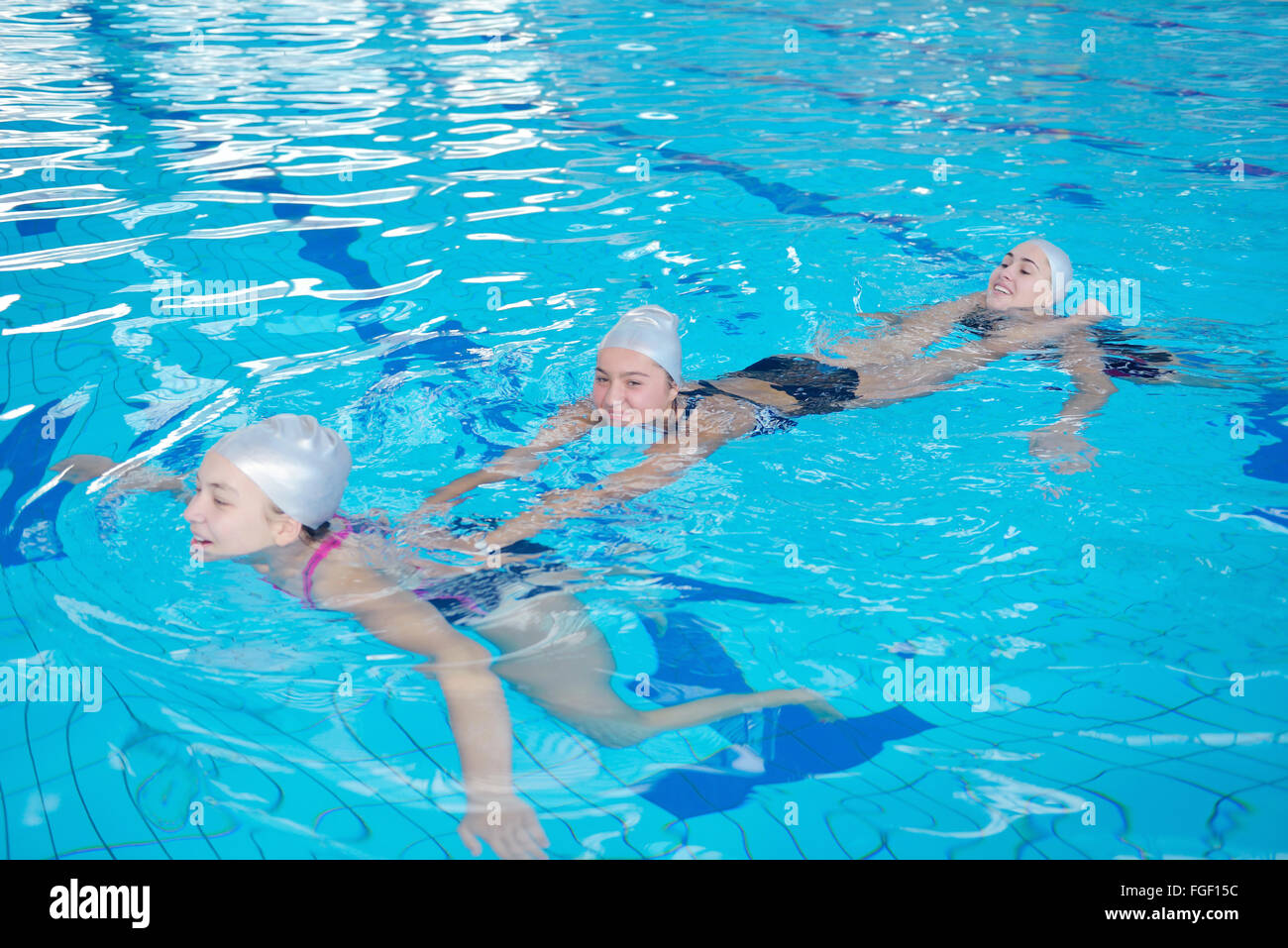 help and rescue on swimming pool Stock Photo