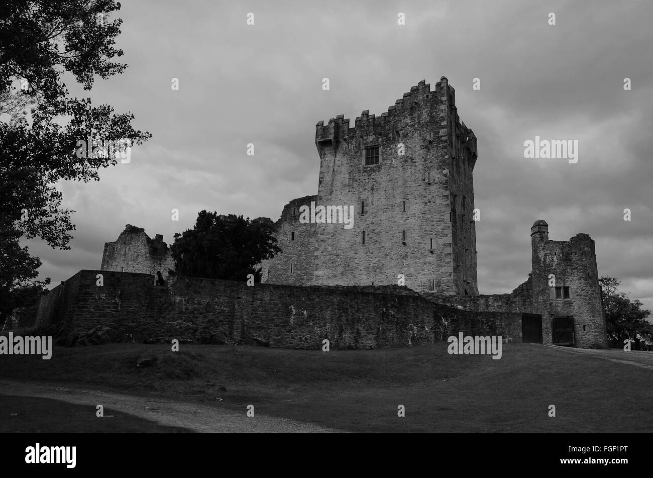 view of the remains of a castle  during a cloudy day , Killarney -ireland black and white Stock Photo