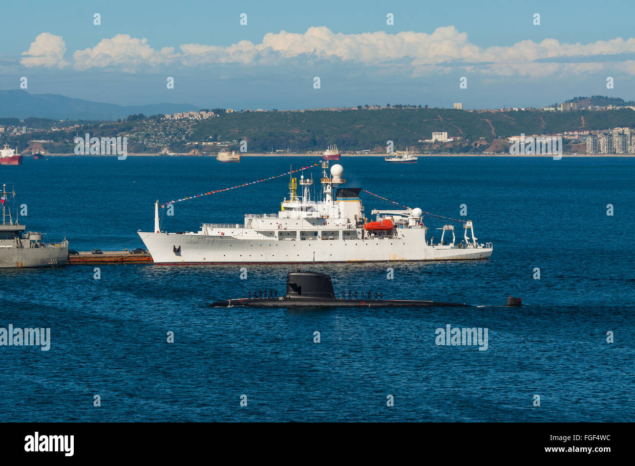 Crew Stands On Deck Of A Navy Submarine As It Returns To Port Stock - crew stands on deck of a navy submarine as it returns to port valparaiso and oceanographic survey us naval ship pathfinder
