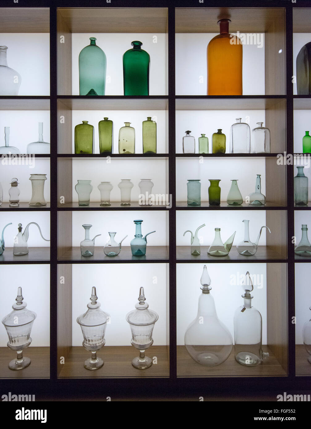 Glass Medicine Bottles on display inside the Medicine Man Exhibition at the Wellcome Collection, London England UK Stock Photo